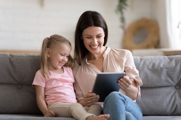 Smiling,Millennial,Nanny,Play,With,Cute,Little,Girl,Child,Enjoy